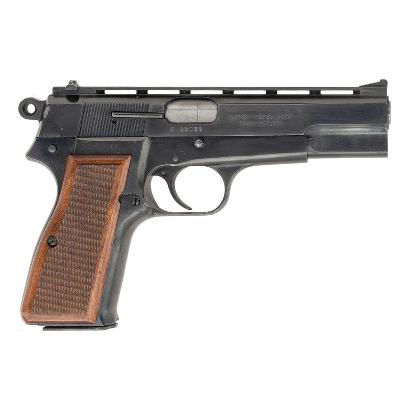 *FEG PJK-9HP Pistol with Vented Rib Slide: *FEG PJK-9HP Pistol with Vented Rib Slide 9mm Para. 4.7" barrel length. SN: F32052. Blued metal finish with polished barrel mounting two piece checkered walnut grips, and fixed rear notch with matted 