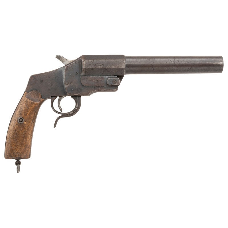 Hebel Model 1894 Signal Flare Pistol: Hebel Model 1894 Signal Flare Pistol World War I 26.5mm. 9" barrel length. SN: 52927. Blued metal finish with polished hammer and trigger with two piece smooth walnut grips and featuring a lanyard loo