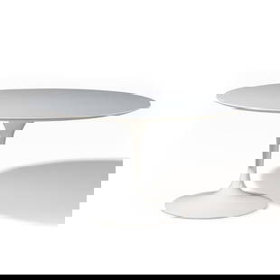 Eero Saarinen (Finnish-American, 1910-1961) Tulip Dining Table, model 174W Knoll, USA: Eero Saarinen (Finnish-American, 1910-1961) Tulip Dining Table, model 174W Knoll, USA laminate and enameled aluminum Eero Saarinen Koll Studio 1957 metal plaque under top of table base. 28 3/4 h x 54