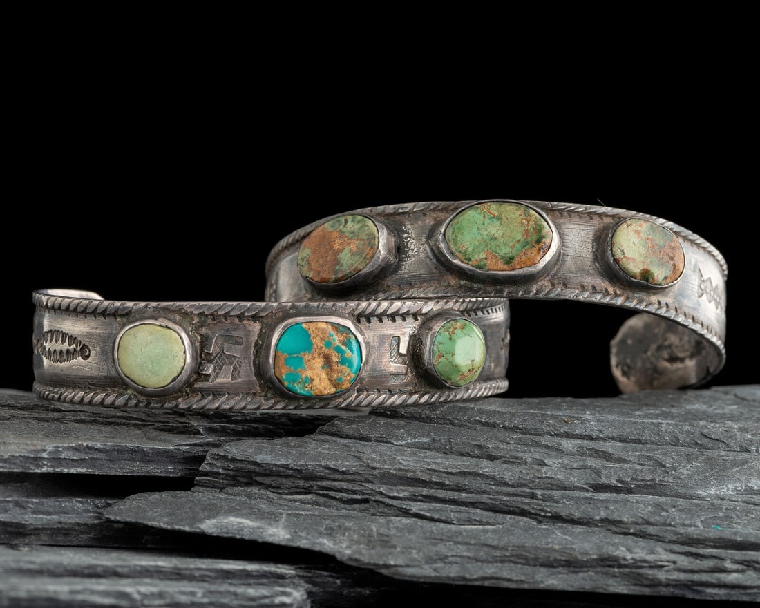 Pair of Navajo Ingot and Turquoise Cuff Bracelets: Pair of Navajo Ingot and Turquoise Cuff Bracelets first quarter 20th century lot of 2, both not marked, includes: one with arrows stamped on the shank cuff width 1/2 inch, interior circumference 5-1/2
