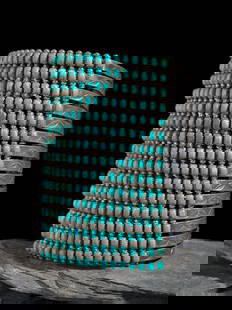 Zuni or Navajo Extra Wide Silver and Turquoise Cluster Cuff Bracelet: Zuni or Navajo Extra Wide Silver and Turquoise Cluster Cuff Bracelet mid-20th century featuring fifteen rows of sixteen turquoise cabochons; further embellished with a stamped shank; not marked cuff w