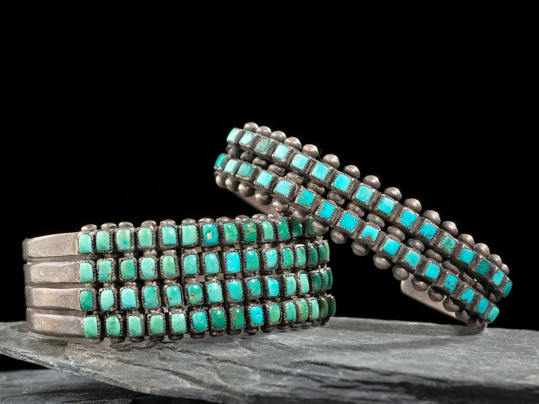 Zuni or Navajo Silver and Turquoise Cluster Cuff Bracelets: Zuni or Navajo Silver and Turquoise Cluster Cuff Bracelets mid-20th century lot of 2, neither are marked, includes: one with two rows of sixteen squared turquoise stones; further embellished with a st