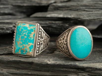 Pair of Curio Silver and Turquoise Rings: Pair of Curio Silver and Turquoise Rings second quarter - mid 20th century lot of 2, neither are marked, includes: one with a beveled rectangular stone and Thunderbird design on shank size 9.5, weight