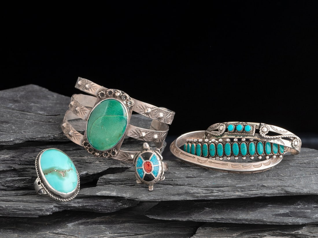 Navajo and Southwestern-style Cuff Bracelets and Rings: Navajo and Southwestern-style Cuff Bracelets and Rings mid-20th century lot of 6, all are unmarked, includes: four cuff bracelets cuff width 1-5/8 inches, interior circumference 5-1/2 inches + gap len