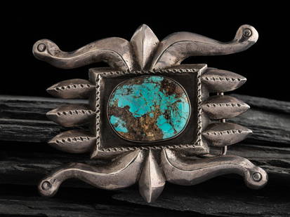 Navajo Sandcast Silver and Turquoise Belt Buckle: Navajo Sandcast Silver and Turquoise Belt Buckle second half 20th century marked with an unidentified hallmark heihgt 3-3/8 inchs x length 4-1/4 inches, belt wifth 1-/2 inches, weightg 126.0 dwt. From