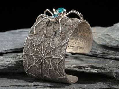 Fidel Bahe (Diné, b. 1949) Silver Tufa Cast Spiderweb Cuff Bracelet, with Turquoise Spider: Fidel Bahe (Diné, b. 1949) Silver Tufa Cast Spiderweb Cuff Bracelet, with Turquoise Spider signed IXHE? cuff width 1-3/4 inches, interior circumference 5-5/8 inches + gap length 1-1/8 inches, wei