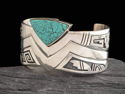Roy Talahaftewa (Hopi, b. 1955) Sterling Silver and Turquoise Cuff Bracelet: Roy Talahaftewa (Hopi, b. 1955) Sterling Silver and Turquoise Cuff Bracelet marked with artist's waterbug hallmark and STERLING cuff width 1-1/2 inches, interior circumference 5-7/8 inches + gap lengt
