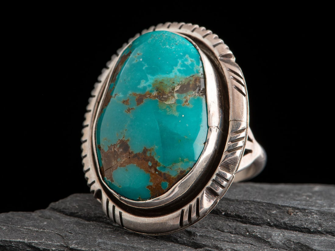 Bea Johnson (Diné, 20th/21st century) Sterling Silver and Turquoise Ring: Bea Johnson (Diné, 20th/21st century) Sterling Silver and Turquoise Ring signed BEA with an arrow and STERLING size 8, weight 8.1 dwt. This lot is located in Cincinnati.