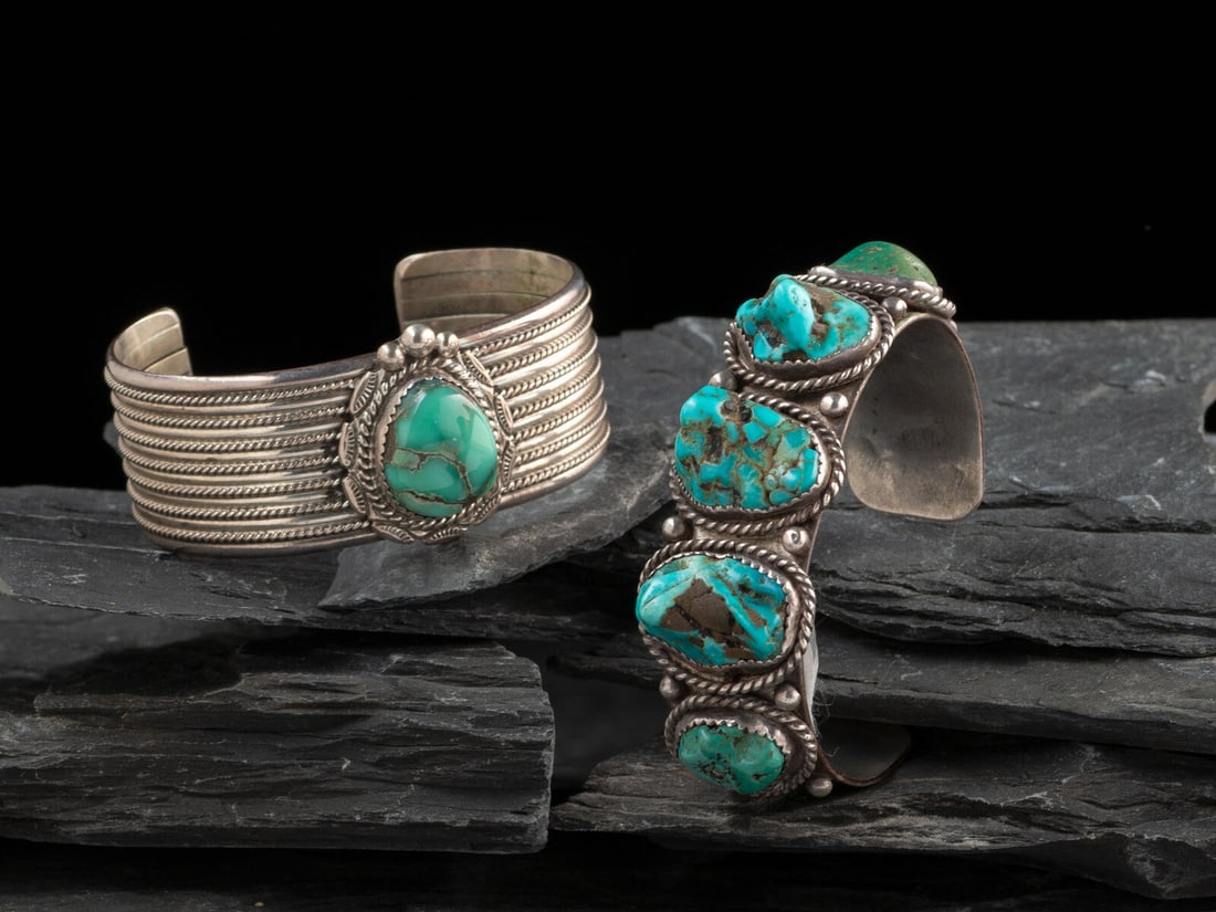 Pair of Navajo Silver and Turquoise Cuff Bracelets: Pair of Navajo Silver and Turquoise Cuff Bracelets second half 20th century lot of 2, includes: one example, with an alternating twisted wire cuff set with a single Carico Lake stone; signed LT BEGAY