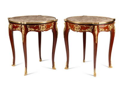 A Pair of Louis XV Style Bronze Mounted Marble-Top Tables: A Pair of Louis XV Style Bronze Mounted Marble-Top Tables 20th Century Height 30 x diameter 27 1/2 inches. This lot is located in Cincinnati.