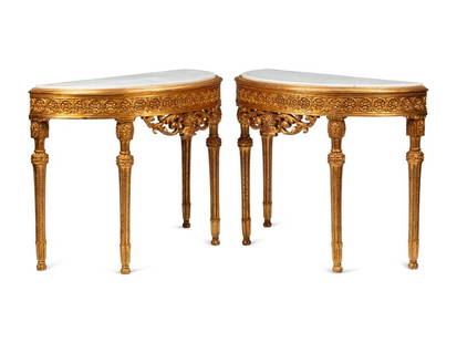 A Pair of Louis XVI Style Giltwood Demilune Marble-Top Console Tables: A Pair of Louis XVI Style Giltwood Demilune Marble-Top Console Tables 20th Century Height 35 x width 46 x depth 20 inches. This lot is located in Cincinnati.