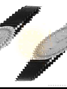 HAMILTON, VINTAGE 14K WHITE GOLD AND DIAMOND WATCH: HAMILTON, VINTAGE 14K WHITE GOLD AND DIAMOND WATCH Maker: Hamilton Year: Circa 1950s Case size: Approx. 31 mm Case material: 14K white gold Bezel: Diamond Dial: Faded silvered matte with diamond hour