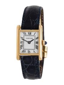 CARTIER NEW YORK, 18K YELLOW GOLD 'TANK' WATCH WITH AUDEMARS PIGUET MOVEMENT AND CARTIER DEPLOYANT