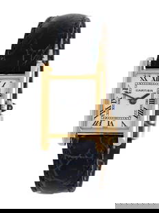 CARTIER NEW YORK, 18K YELLOW GOLD 'TANK' WATCH WITH AUDEMARS PIGUET MOVEMENT AND CARTIER DEPLOYANT: CARTIER NEW YORK, 18K YELLOW GOLD 'TANK' WATCH WITH AUDEMARS PIGUET MOVEMENT AND CARTIER DEPLOYANT BUCKLE Maker: Cartier New York Model: Tank Reference number: 21003 Year: Circa 1960s Case size: Appro