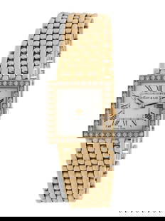 TIFFANY & CO., YELLOW GOLD AND DIAMOND WATCH: TIFFANY &amp; CO., YELLOW GOLD AND DIAMOND WATCH Maker: Tiffany &amp; Co. Serial number: 940591401 Case size: Approx. 19 x 19 mm Case material: 14K yellow gold Bezel: Diamond Dial: White Movement: Qua