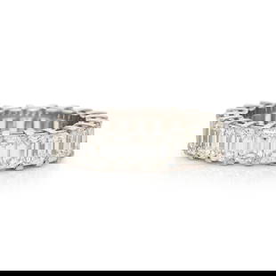 PLATINUM AND DIAMOND ETERNITY RING: PLATINUM AND DIAMOND ETERNITY RING Twenty-one emerald cut diamonds weighing approximately 6.34 carats total. Platinum. Ring size 6 1/4. Stamp: PLAT D6.34. Gross weight: 5.00 dwt. This lot is located i