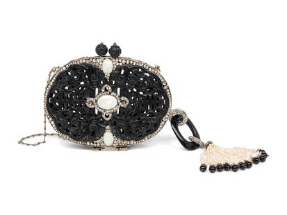 IRADJ MOINI, FILIGREE CARVED MINAUDIÈRE: IRADJ MOINI, FILIGREE CARVED MINAUDI&#200;RE Evening minaudiere clutch/shoulder bag in filigree carved black stone with silver-tone hardware; features inset rhinestone and mother-of-pearl embellishmen
