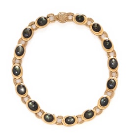BLACK STAR SAPPHIRE, DIAMOND, AND YELLOW GOLD NECKLACE
