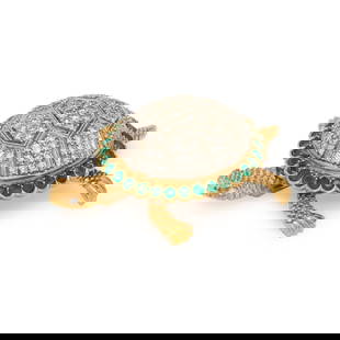 EMERALD AND DIAMOND TURTLE BROOCH: EMERALD AND DIAMOND TURTLE BROOCH Single cut diamonds weighing approximately 1.25 carats total and round emeralds. White and yellow gold. 1 3/4 x 1 1/4 inches. Gross weight: 10.20 dwt. This lot is loc