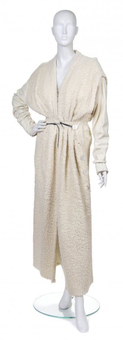 Gianfranco Ferre, (Italian, 1944-2007), Coat: Gianfranco Ferre (Italian, 1944-2007) Coat cream fur and suede. no size.