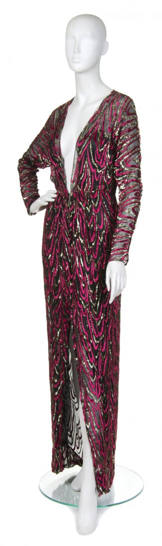 Oscar de la Renta, (Dominican/American, b. 1932), Eveni: Oscar de la Renta (Dominican/American, b. 1932) Evening Gown black chiffon with red and gold swirl applique no size.