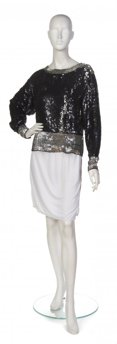 Yves Saint Laurent, (Algerian/French, 1936-2008), Eveni: Yves Saint Laurent (Algerian/French, 1936-2008) Evening Top black and silver sequins no size.