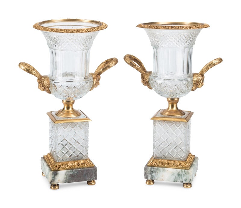 A Pair of French Gilt Bronze Mounted Cut Glass Urns: A Pair of French Gilt Bronze Mounted Cut Glass Urns 20th Century Height 17 1/2 x width 11 x depth 8 inches. This lot is located in Cincinnati.