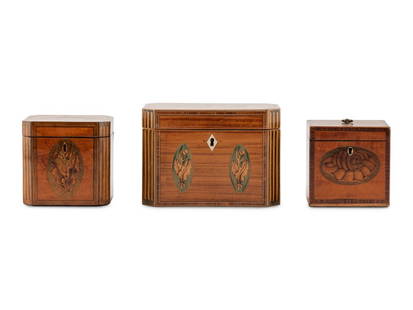 A Group of Three George III Harewood and Marquetry Tea Caddies: A Group of Three George III Harewood and Marquetry Tea Caddies 18th/19th Century the largest example opening to an interior with two compartments, the smaller examples with vacant interiors. Height