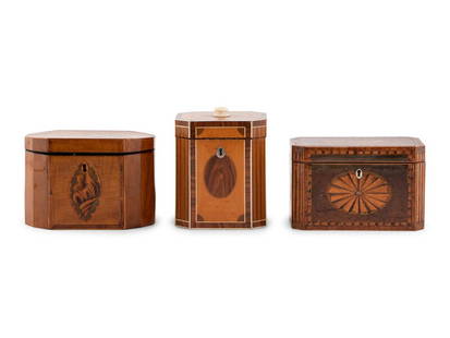 A Group of Three George III Tea Caddies: A Group of Three George III Tea Caddies Second Half 18th Century comprising a square example with canted corners, the body decorated with satinwood, mahogany and Tunbridge parquetry decoration, one e