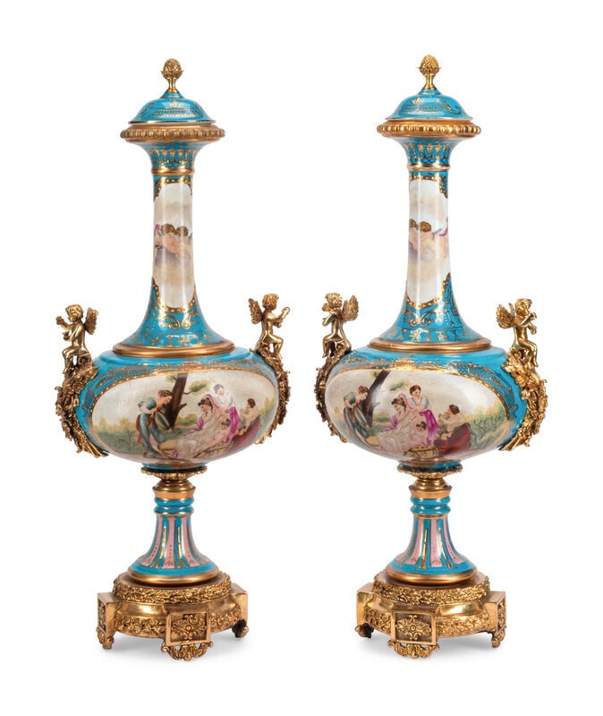 A Pair of Gilt Bronze Mounted Sèvres Style Porcelain Vases and Covers: A Pair of Gilt Bronze Mounted Sèvres Style Porcelain Vases and Covers 19th/20th Century Height 30 inches. This lot is located in Cincinnati.