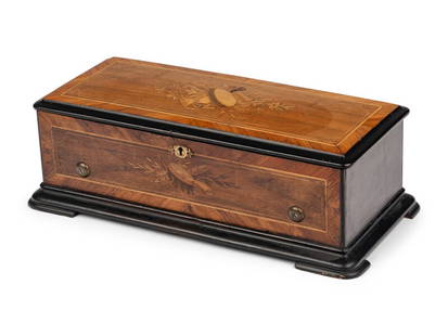 A Swiss Cylinder Music Box: A Swiss Cylinder Music Box Mid 19th Century playing 8 airs on an 11-inch cylinder. Height of case 7 x width 21 1/2 x depth 10 1/4 inches. This lot is located in Chicago