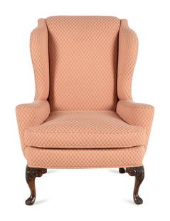 A George II Style Walnut Wingback Armchair: A George II Style Walnut Wingback Armchair 19th/20th Century Height 40 x width 32 3/4 x depth 28 inches. Property from the Charlecote Antique Store, Kansas City, Missouri This lot is loc