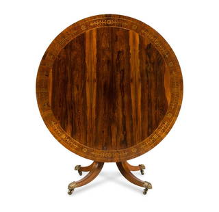 A Regency Rosewood Center Table: A Regency Rosewood Center Table Circa 1815 Height 28 x diameter 49 inches. This lot is located in Chicago.