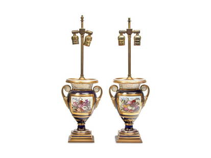 A Pair of English Porcelain Cobalt-Blue Urns Mounted as Lamps: A Pair of English Porcelain Cobalt-Blue Urns Mounted as Lamps Circa 1825 each bearing red-painted accession numbers to base, "63.42." Height 12 1/2 x width 7 3/4 x depth 6 1/4 inches (urns only