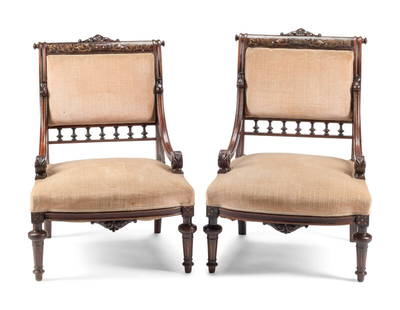 A Pair of Victorian Mahogany Slipper Chairs: A Pair of Victorian Mahogany Slipper Chairs 19th Century Height 33 1/2 x width 24 x depth 22 inches. This lot is located in Cincinnati.