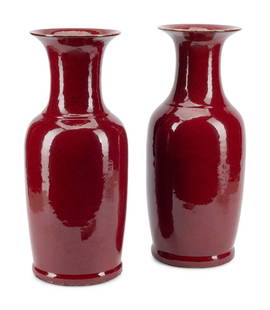 A Pair of Chinese Sang de Boeuf Glazed Porcelain Vases: A Pair of Chinese Sang de Boeuf Glazed Porcelain Vases 20th Century Height 21 x diameter 8 1/2 inches. This lot is located in Cincinnati.