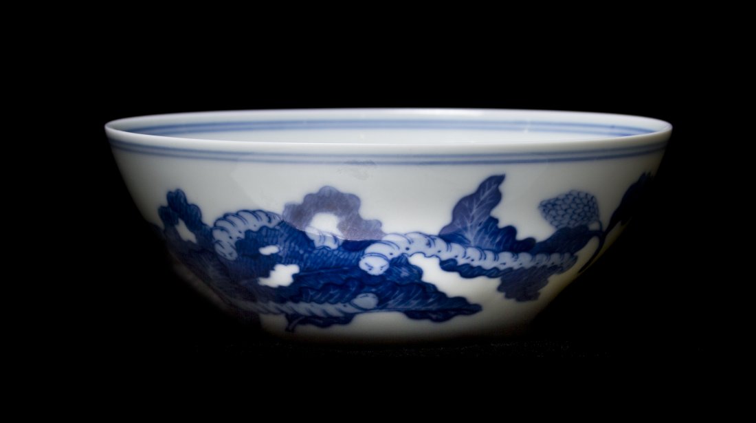 A Chinese Blue and White Porcelain Bowl, Diameter 5 1/8: A Chinese Blue and White Porcelain Bowl, of circular form, the underglaze blue decoration depicting silkworms eating mulberry leaves, bearing Jiangxi manufacturer mark to the underside within a double