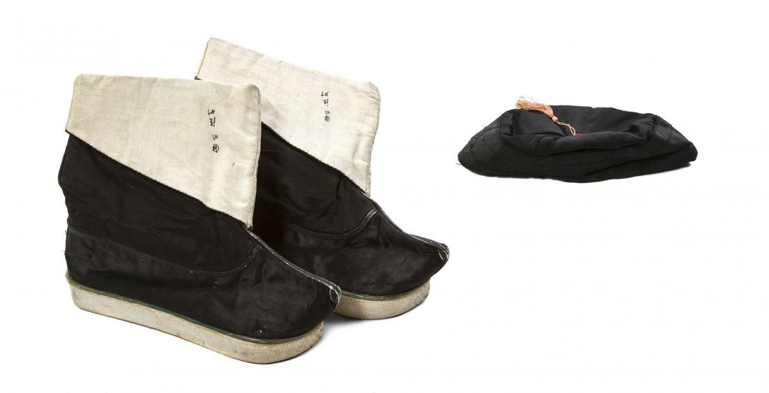 A Chinese Man's Coat, Hat and Boots, Length of first 48: A Chinese Man's Coat, Hat and Boots, each of black silk, the coat with silk toggle button closure and lined with pale blue silk. Length of first 48 inches.