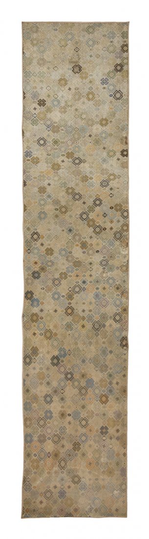 A Chinese Embroidered Silk Panel, Height of silk 77 1/4: A Chinese Embroidered Silk Panel, of rectangular form, having an allover pattern of wan symbols and flowers in geometric borders, framed. Height of silk 77 1/4 x width 21 1/2 inches. Property from the