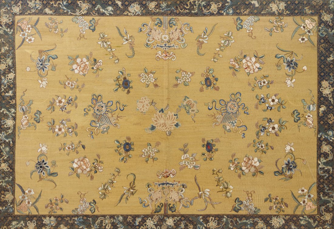 A Chinese Embroidered Silk Panel, Height of visible 55 : A Chinese Embroidered Silk Panel, of rectangular form, depicting auspicious objects including bats, lingzhi fungus, and double fish, within a patterned border depicting additional emblems. Height of v