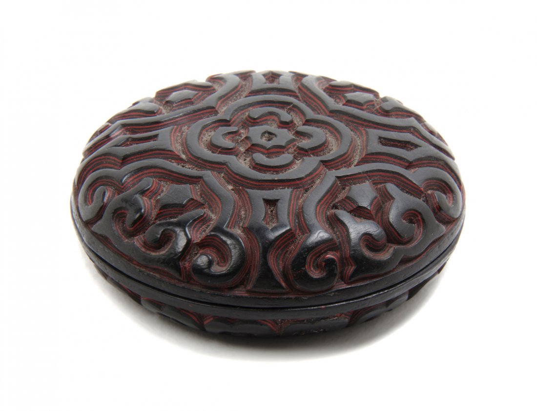 A Two-Color Cinnabar Lacquer Paste Box, Diameter 2 7/8 : A Two-Color Cinnabar Lacquer Paste Box, of circular lidded form, marked to the underside. Diameter 2 7/8 inches.