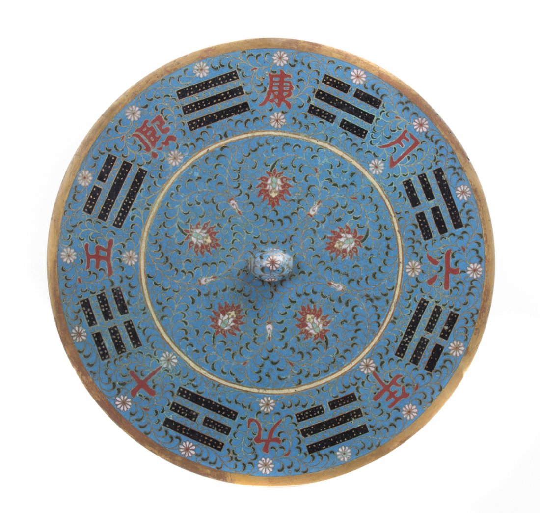 A Cloisonne Enameled Bronze Mirror, Diameter 11 3/4 inc: A Cloisonne Enameled Bronze Mirror, of circular form centered with a pierced knop, bearing character inscription spaced with stylized trigrams. Diameter 11 3/4 inches.