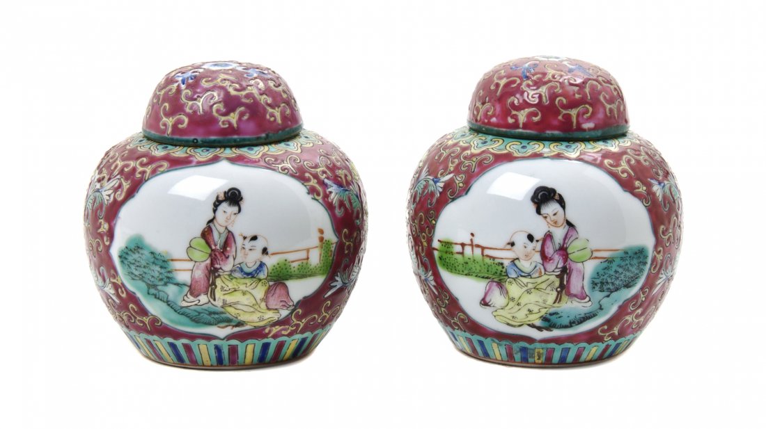 A Pair of Polychrome Enameled Porcelain Ginger Jars, He: A Pair of Polychrome Enameled Porcelain Ginger Jars, each having figural decoration within a shaped reserve above a lappet border. Height 5 inches.