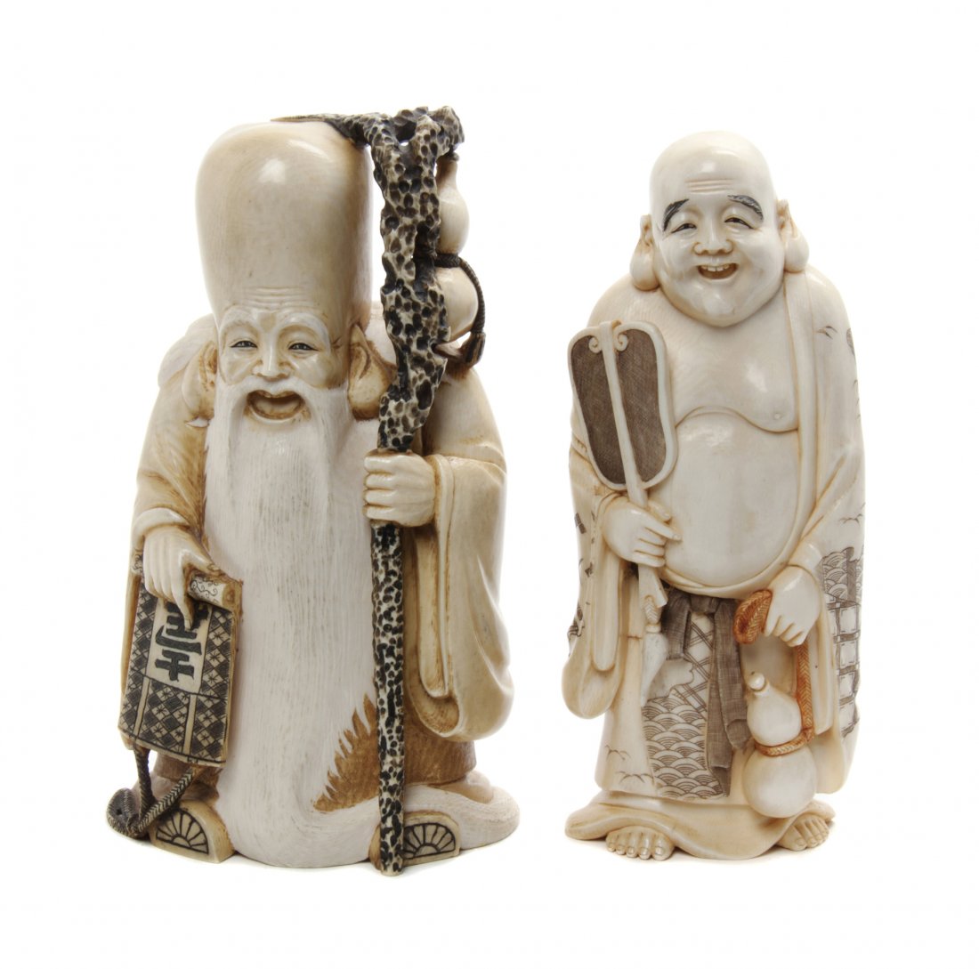 Two Japanese Carved Ivory Okimono, Height of tallest 6 : Two Japanese Carved Ivory Okimono, the first depicting Juro with a staff and tablet, the other a hotei with a leaf-form fan and double gourd. Height of tallest 6 inches.