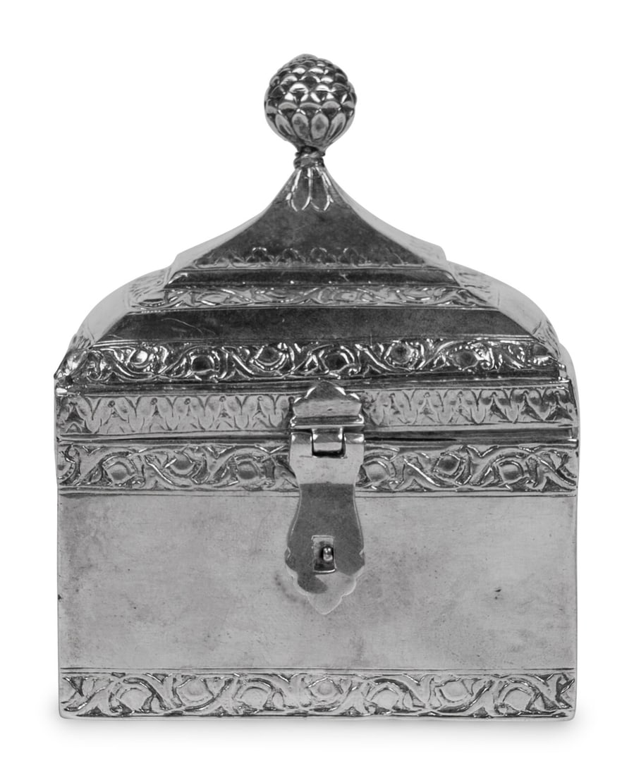 An Indian Silver Scent Flask Caddy: An Indian Silver Scent Flask Caddy the fitted interior with four scent flasks. apparently unmarked Height 4 1/2 x width 3 1/2 x depth 2 1/2 inches. Property of a California Collector