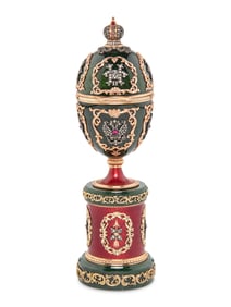 A Gold, Enamel and Gemstone-Mounted Nephrite Surprise Egg