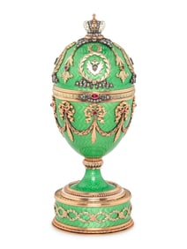 A Gold, Guilloché Enamel and Gemstone-Mounted Surprise Egg