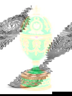 A Gold, Guilloché Enamel and Gemstone-Mounted Surprise Egg: A Gold, Guilloch&#233; Enamel and Gemstone-Mounted Surprise Egg Spurious Faberg&#233; Marks, 20th Century having Russian Imperial double-eagle mark, opening to reveal an elephant, together with wooden