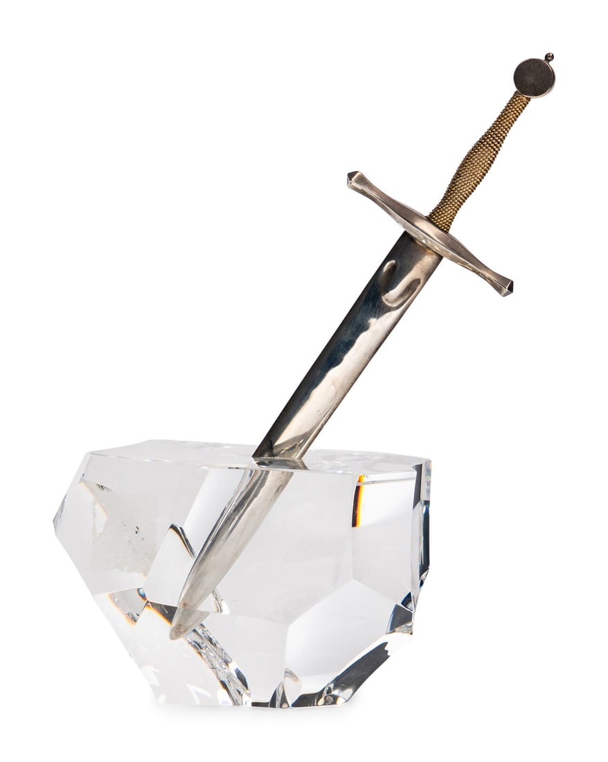 A Steuben Glass, Sterling Silver and 18 Karat Gold Excalibur Sculpture: A Steuben Glass, Sterling Silver and 18 Karat Gold Excalibur Sculpture Designed by James Houston, Modern Model 1000, signed Steuben on underside, sword stamped Steuben, Sterling, 18KS. Height 8 inches