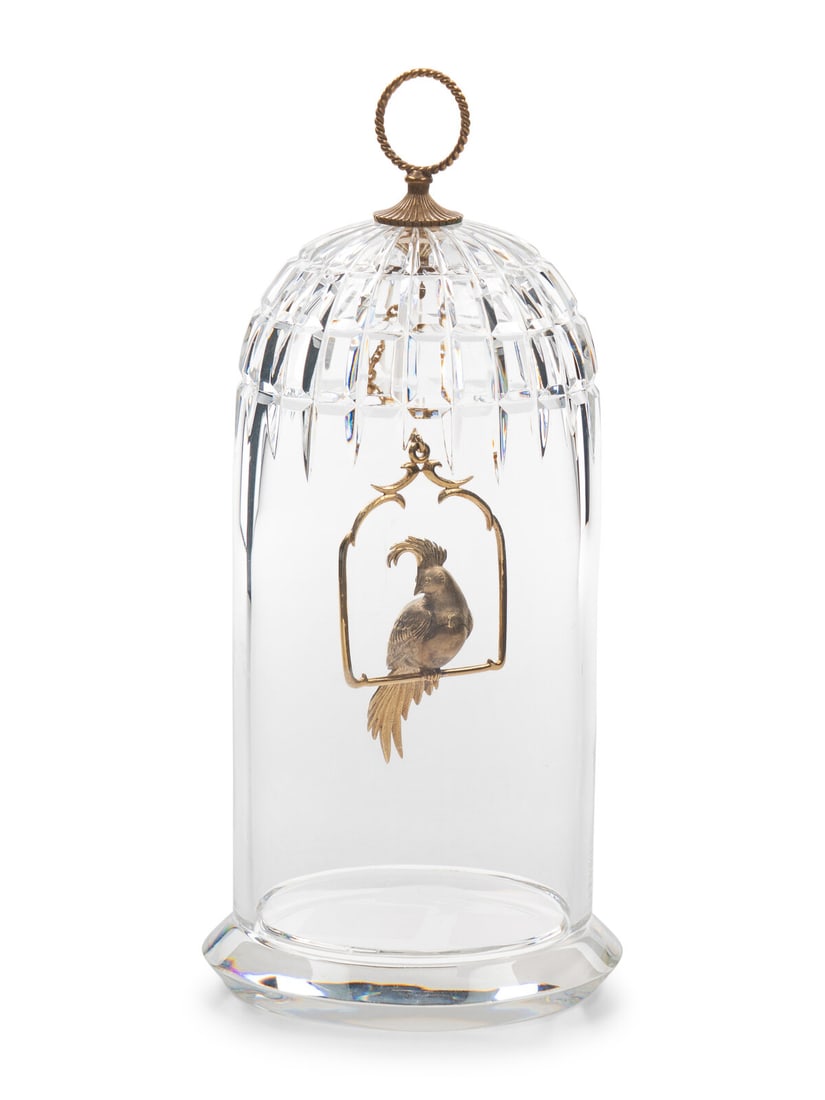 A Steuben Cut Glass and 18 Karat Gold Bird Cage Sculpture: A Steuben Cut Glass and 18 Karat Gold Bird Cage Sculpture Designed by George Thompson Model 1017, signed 'Steuben'. Height 8 inches. Property of a California Collector This lot is located in Chicago.